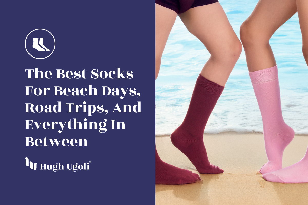 Two people wearing Hugh Ugoli crew socks—one in burgundy, one in pink—standing at the edge of the ocean, highlighting breathable sock options for summer adventures.
